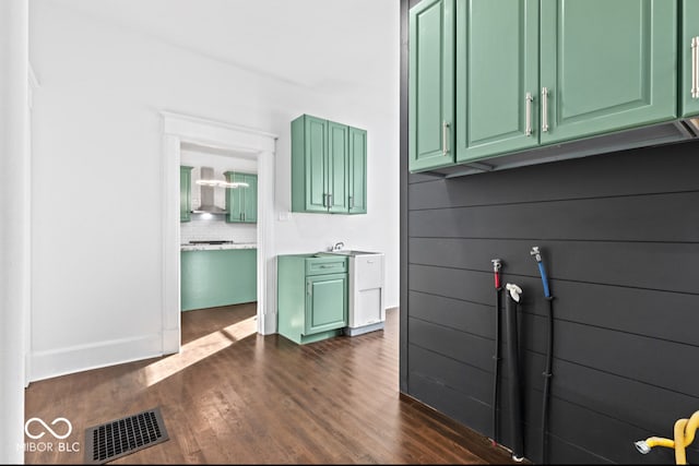 interior space with cabinets and dark hardwood / wood-style floors