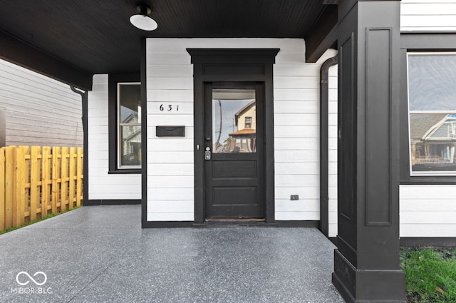 doorway to property featuring a porch