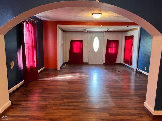 foyer entrance with dark hardwood / wood-style floors