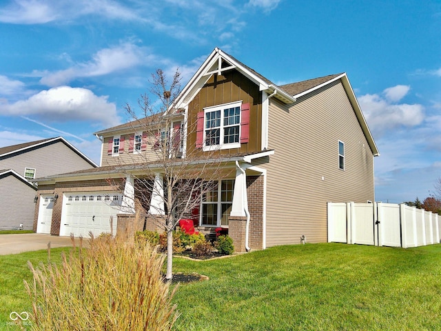 craftsman house featuring a front lawn and a garage