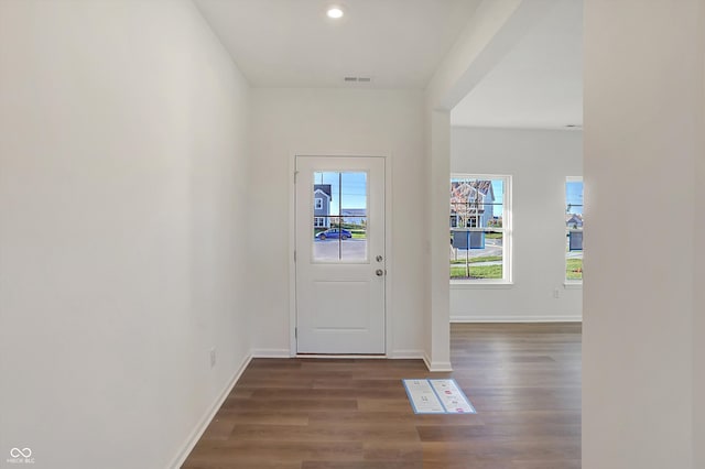 doorway featuring dark hardwood / wood-style flooring