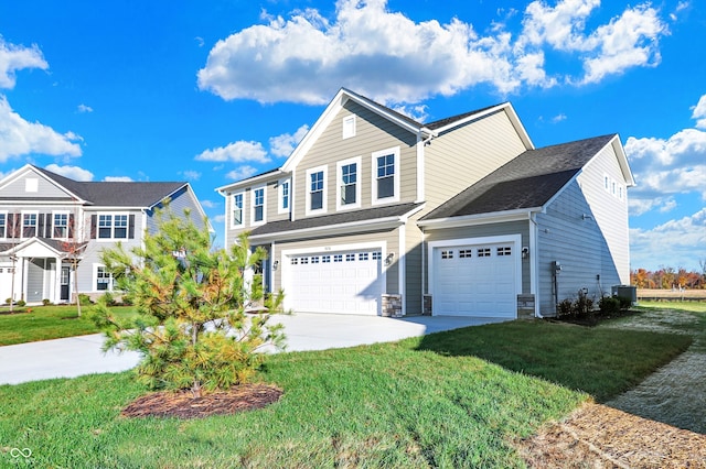 view of front of property featuring cooling unit, a front lawn, and a garage