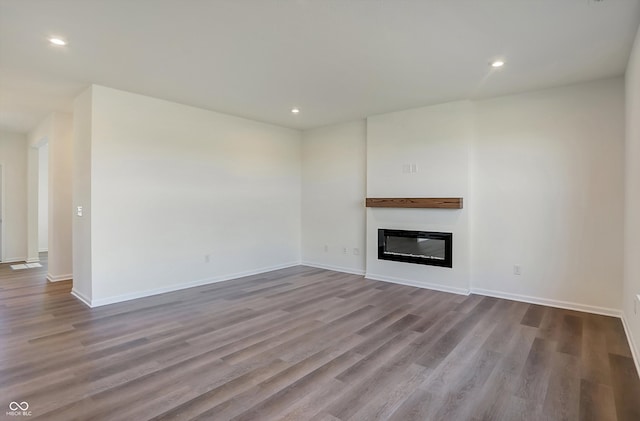 unfurnished living room with light hardwood / wood-style floors