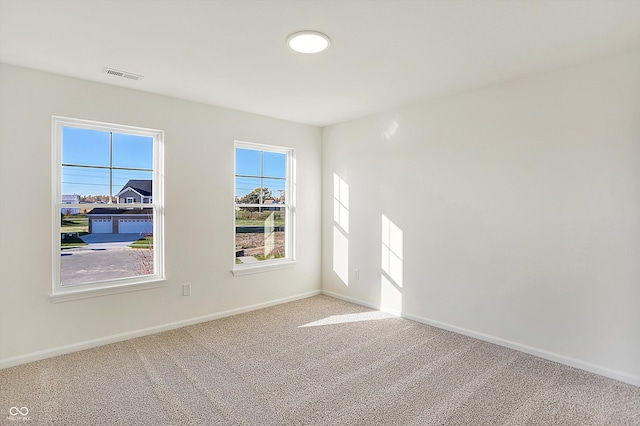 view of carpeted spare room