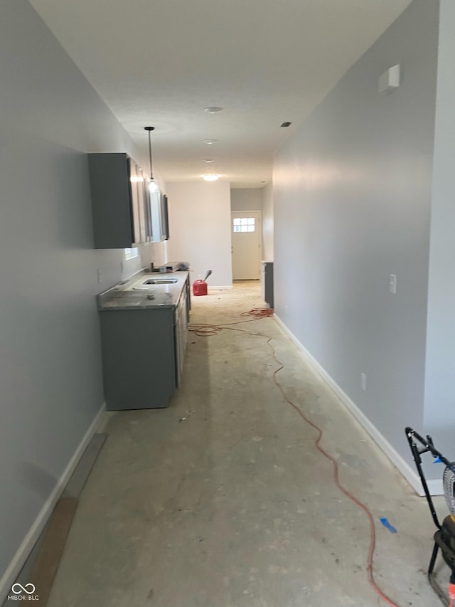 hallway featuring sink