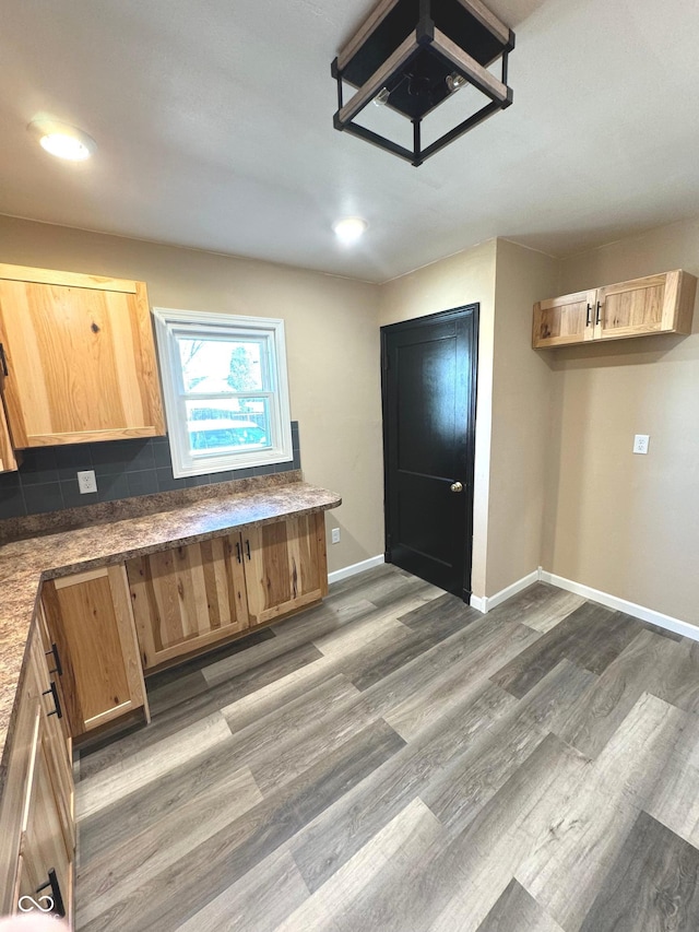 kitchen with wood-type flooring