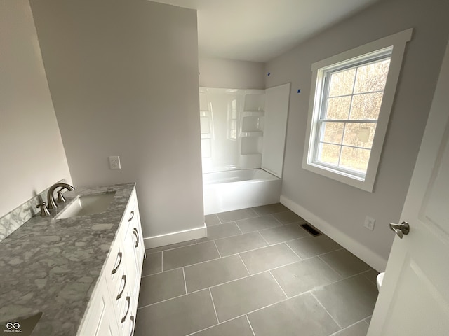 bathroom with tile patterned floors, vanity, and shower / bath combination