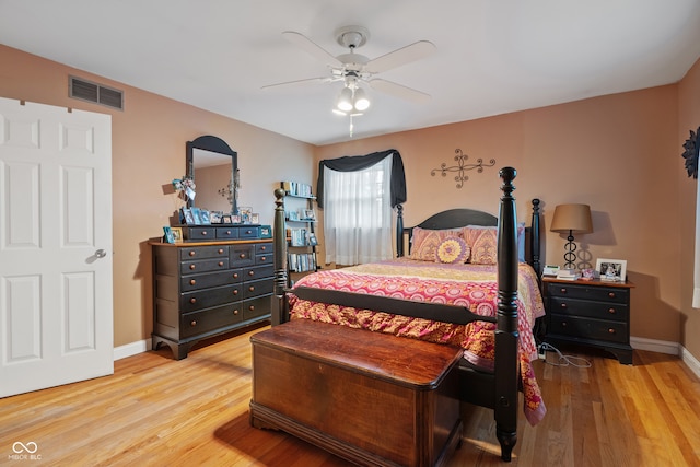 bedroom with ceiling fan and light hardwood / wood-style flooring