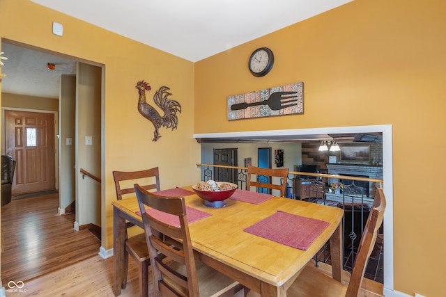 dining area featuring light wood-type flooring