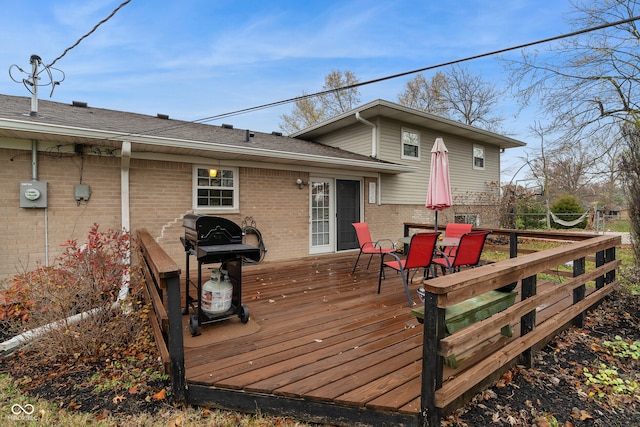 wooden terrace with grilling area