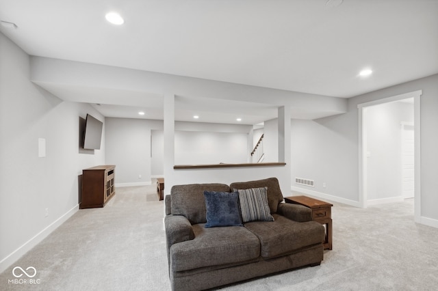 living room with light colored carpet