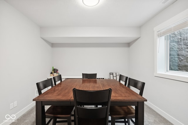 view of carpeted dining room