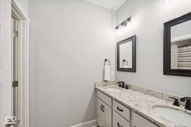 bathroom featuring vanity