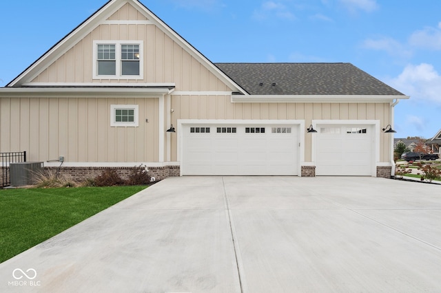 view of front facade with a garage and a front yard