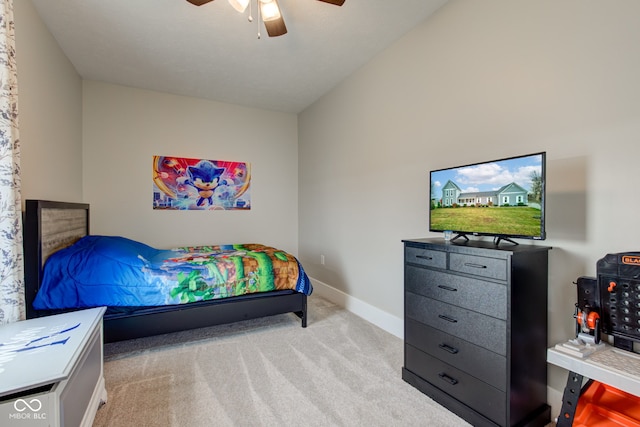 bedroom with light colored carpet and ceiling fan