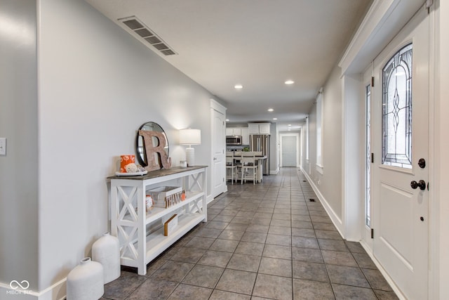 view of tiled foyer