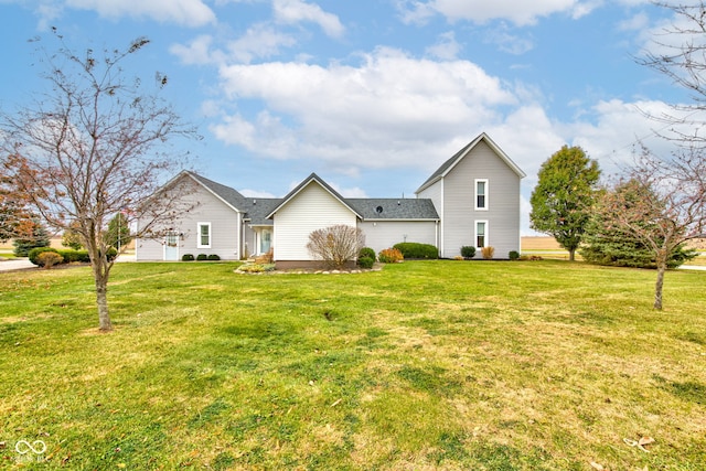 view of side of property with a yard