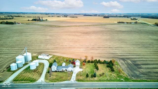 birds eye view of property featuring a rural view