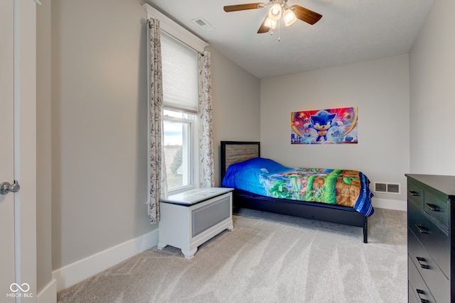 carpeted bedroom featuring ceiling fan