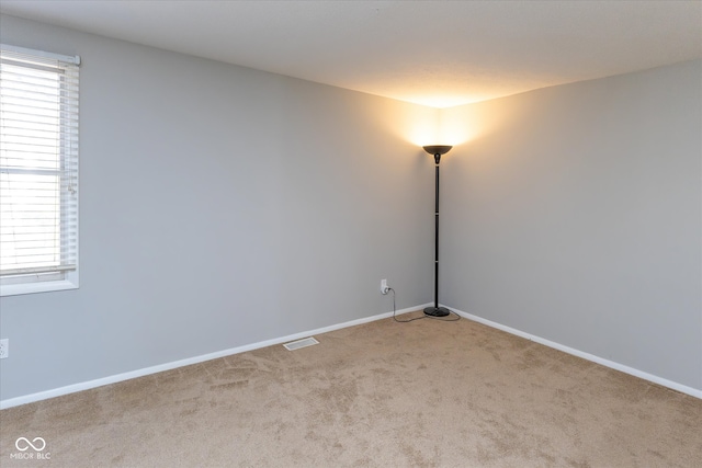 empty room with light carpet