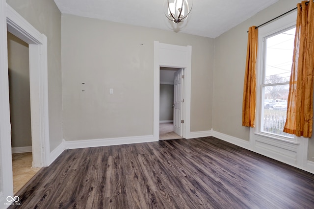 empty room featuring dark hardwood / wood-style floors