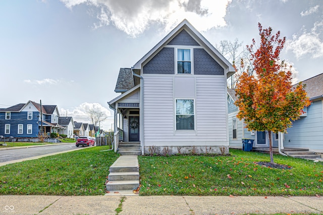 view of front of house featuring a front lawn