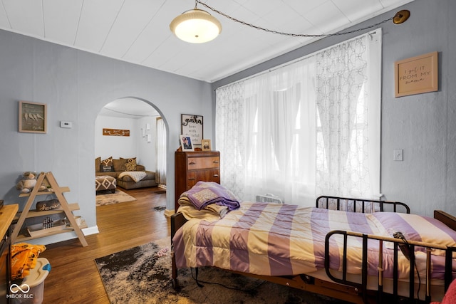 bedroom featuring hardwood / wood-style floors