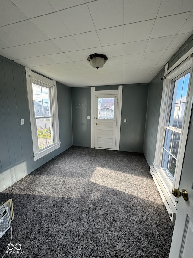 interior space featuring baseboard heating