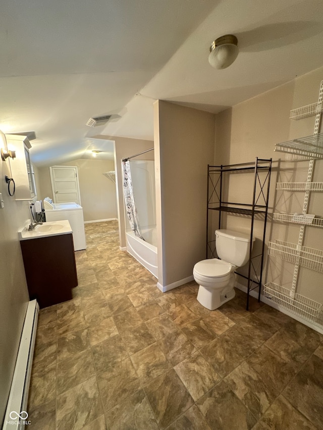 full bathroom with baseboard heating, washer / dryer, shower / bath combination with curtain, toilet, and vanity