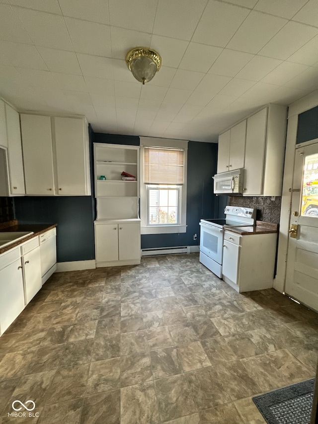 kitchen featuring tasteful backsplash, white cabinetry, white appliances, and baseboard heating