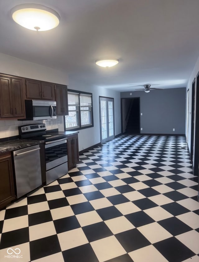 kitchen featuring ceiling fan, dark brown cabinetry, backsplash, and appliances with stainless steel finishes