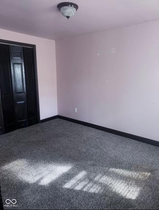 spare room with carpet flooring