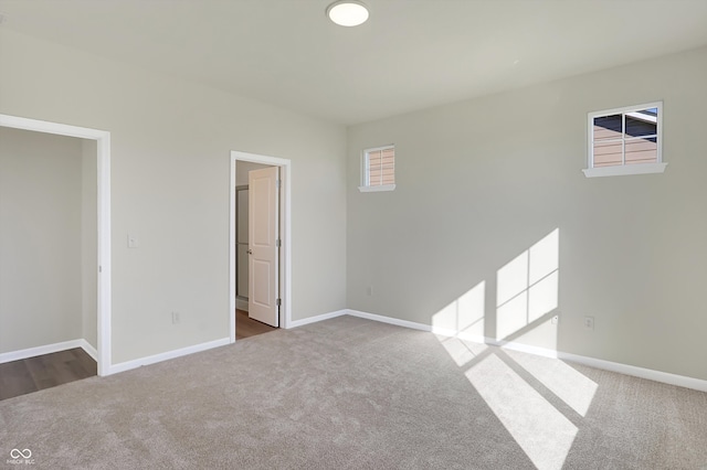 unfurnished bedroom featuring carpet