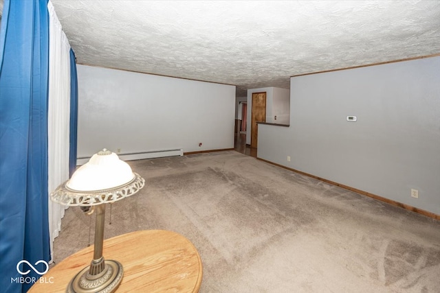 carpeted empty room featuring a textured ceiling