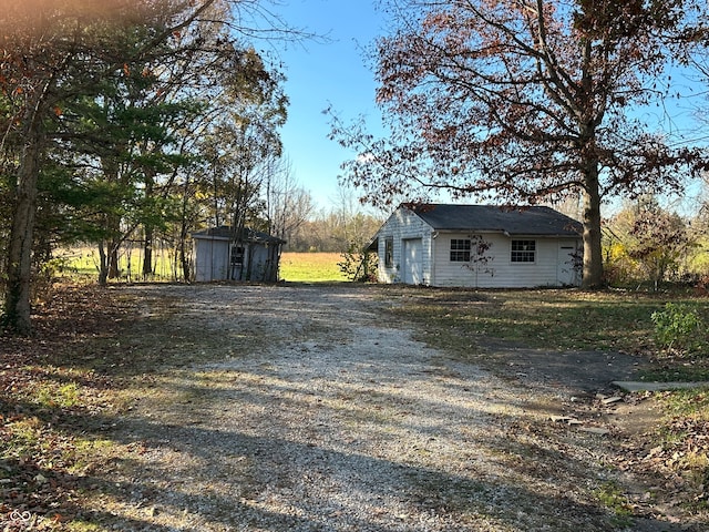 exterior space featuring a shed