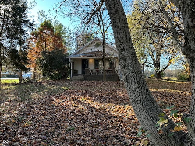 view of home's exterior with covered porch