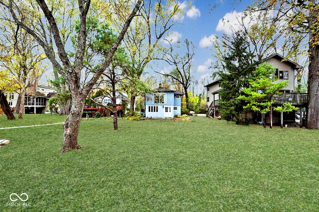 view of yard featuring a deck