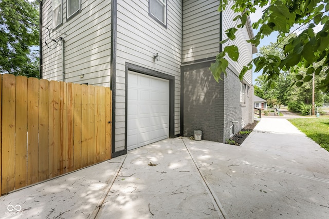 view of home's exterior with a garage