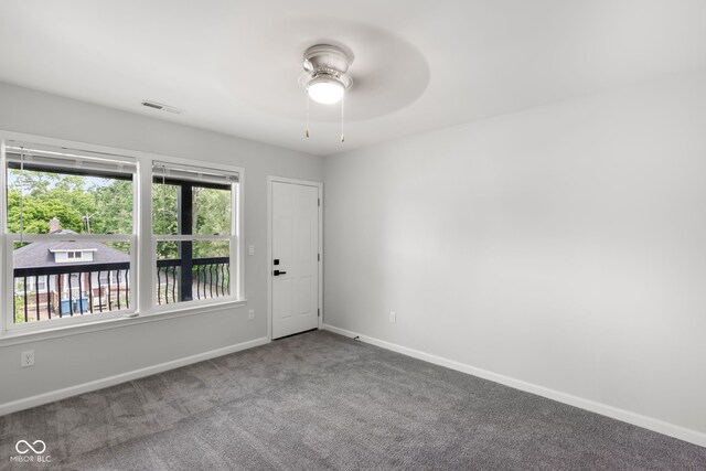 unfurnished room featuring carpet floors and ceiling fan