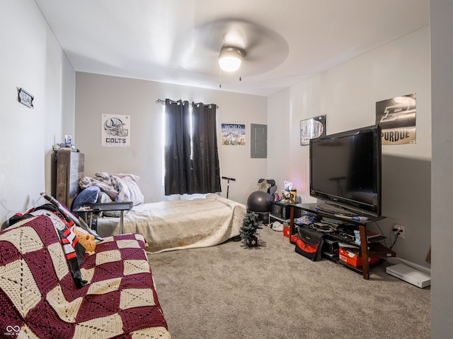 carpeted bedroom featuring electric panel and ceiling fan