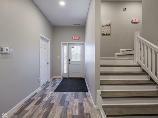 foyer entrance with hardwood / wood-style floors