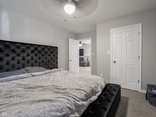 bedroom featuring ceiling fan and carpet floors