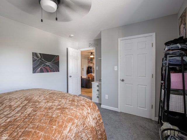 carpeted bedroom with ceiling fan