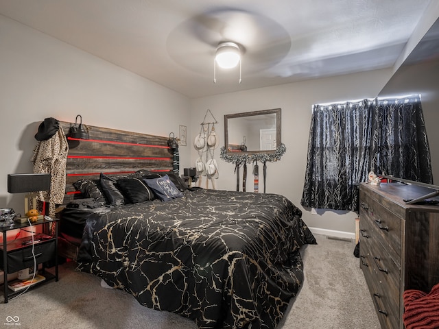 bedroom featuring ceiling fan and carpet flooring