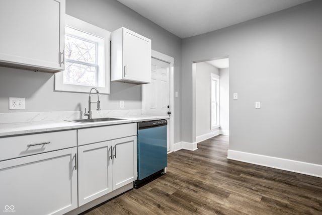 kitchen featuring sink, light stone counters, stainless steel dishwasher, white cabinets, and dark hardwood / wood-style flooring