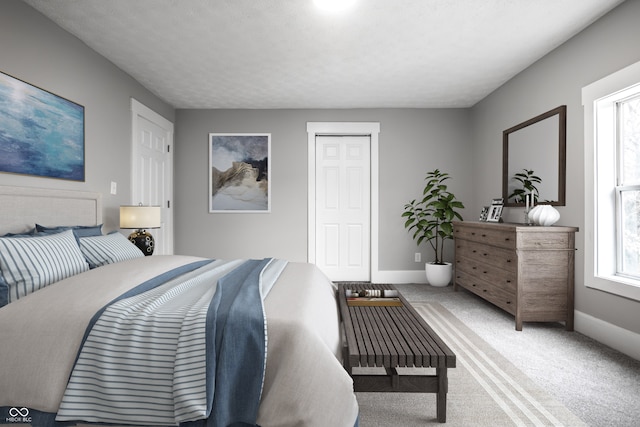 carpeted bedroom with a textured ceiling