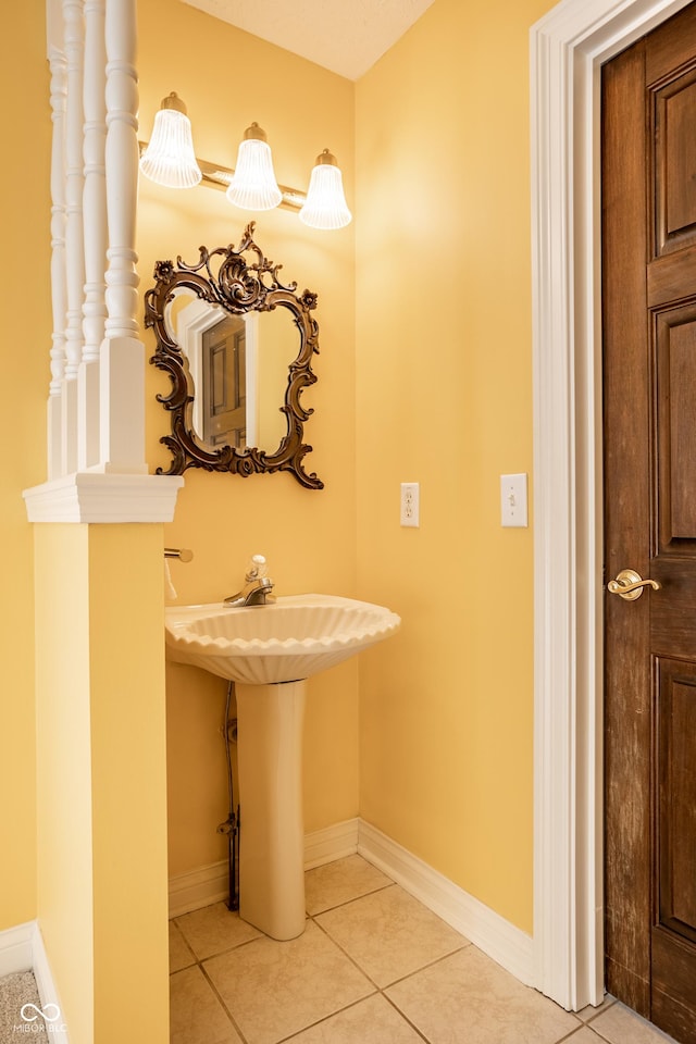 bathroom with tile patterned flooring