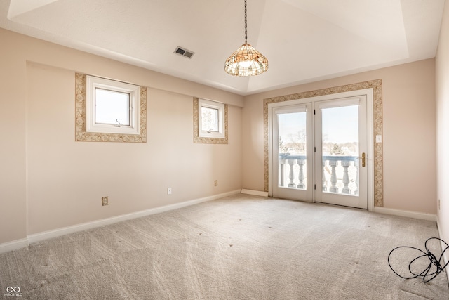 unfurnished room featuring carpet flooring