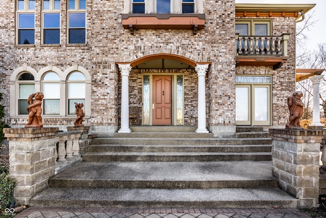 doorway to property featuring a balcony