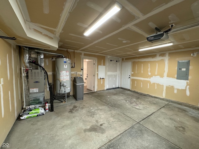 garage featuring gas water heater, a garage door opener, and electric panel